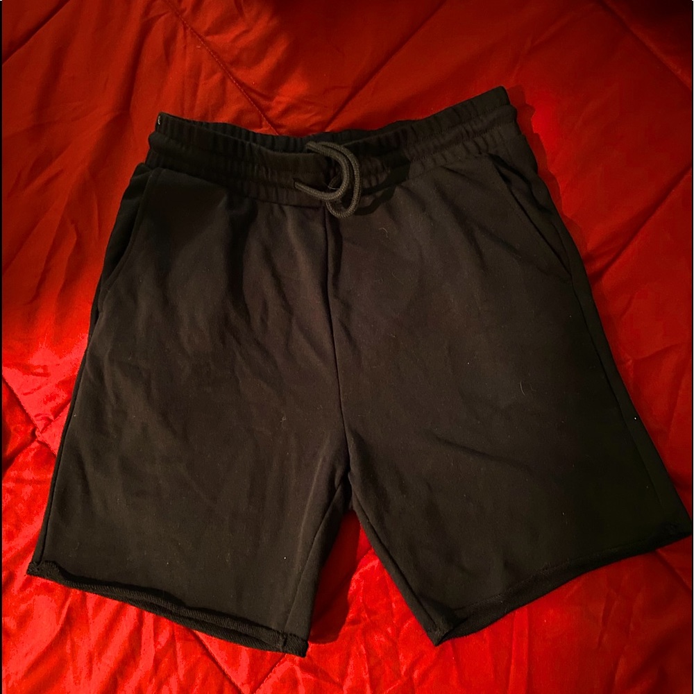 Waistband with covered elastic and drawstring.